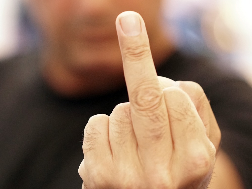 Raising middle finger means fuck you